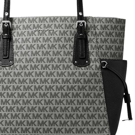 michael kors voyager tote graphite|Michael Kors zip top tote.